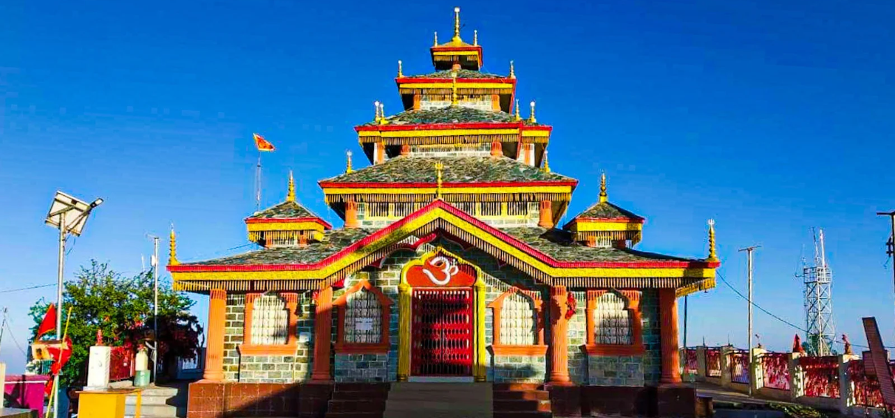 Beautiful view of the sacred temple featured in our Kanatal tour package