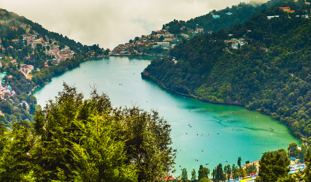Beautiful aerial view of Naini Lake included in the jim corbett nainital and Lansdowne trip for a relaxing vacation.
