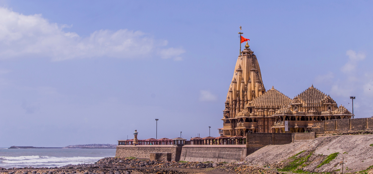 Beautiful gold temple spire and the sea walls up close. Our all-inclusive Somnath holiday packages make it easy to visit this beautiful spot. Fly into Keshod Airport and enjoy a stress-free trip with our expert Somnath travel packages.