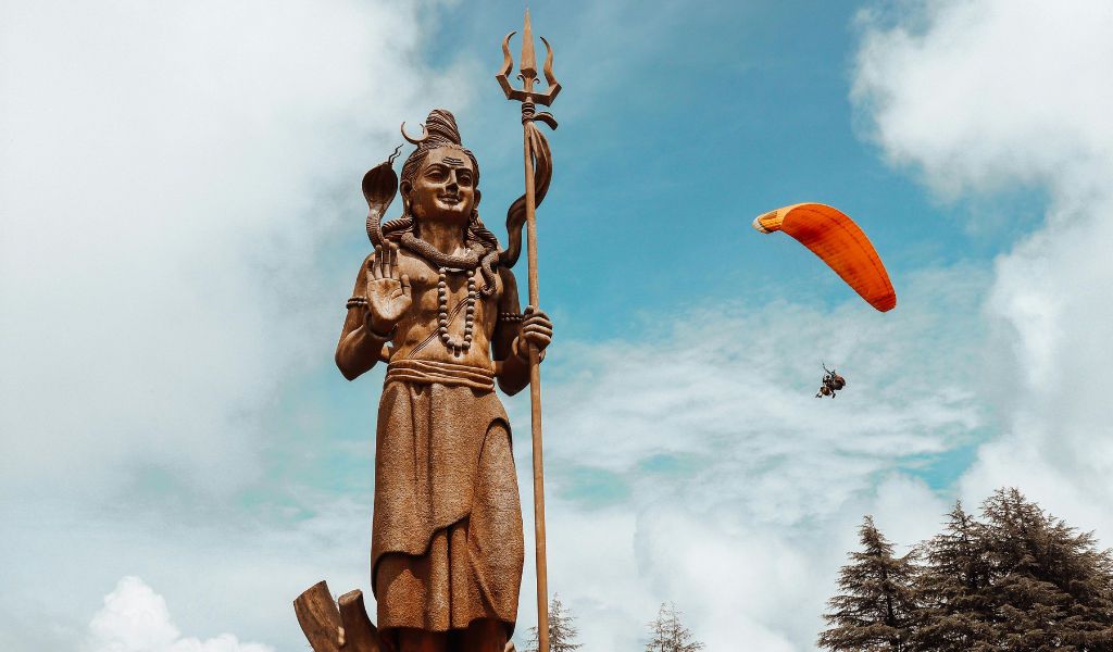 Dalhousie Tour Package shiv statue and paragliding view