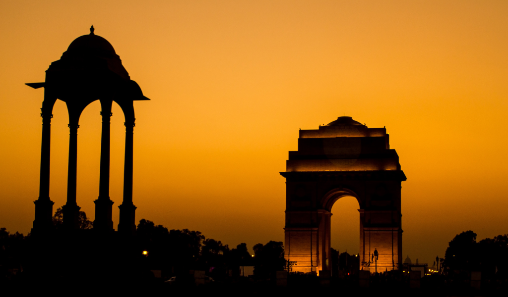 Delhi Tour Package India Gate sunset silhouette