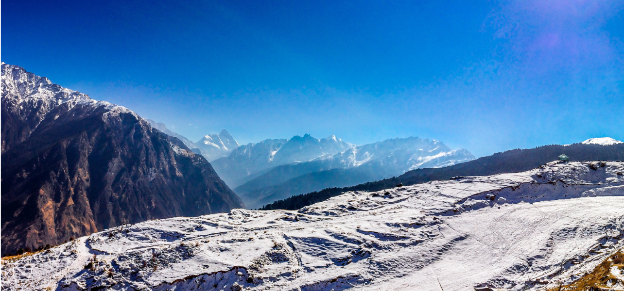 Scenic view of Himalayan snow peaks and ski slopes at Auli place in Uttarakhand.S