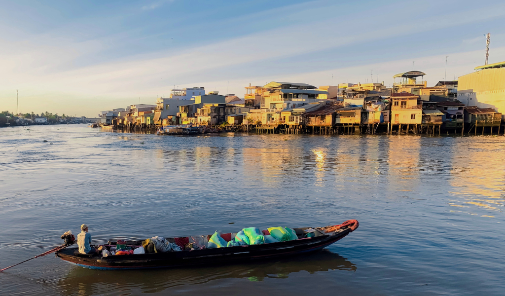 A peaceful morning boat ride on the Ganga in Varanasi, part of our comprehensive Ayodhya Ram Mandir Tour Package.