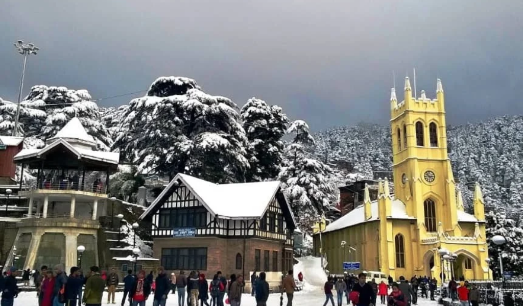Snow-covered Ridge and Christ Church during winter season in our Shimla Tour Package