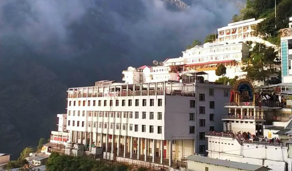 Katra Tour Package featuring Vaishno Devi Bhawan day view in the Trikuta Mountains with a beautiful spiritual atmosphere